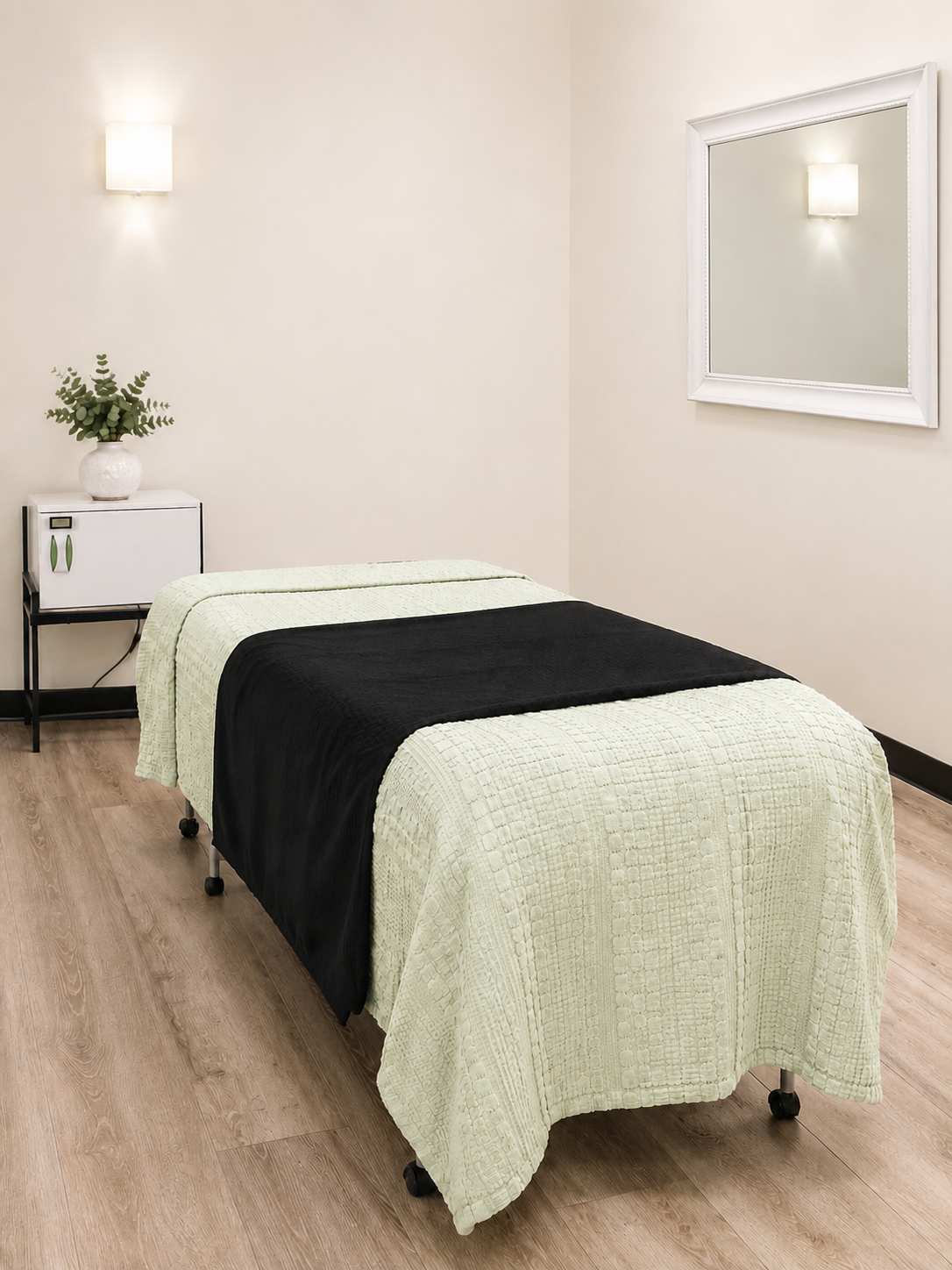 Private esthetics treatment room with professional treatment table